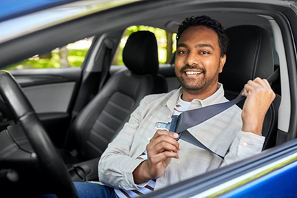 Man talking on the phone while driving