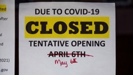 sign stating closed due to COVID-19