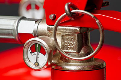 close-up of pin on fire extinguisher