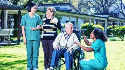 two senior citizens and two medical workers