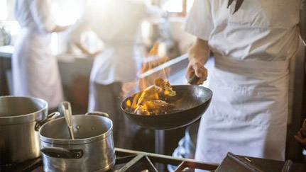 food cooking on gas stovetop