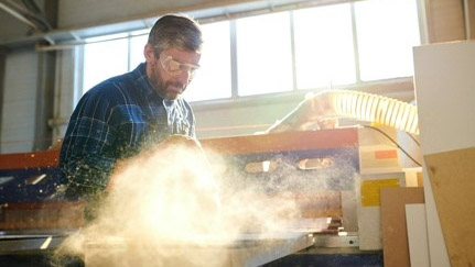 man working in a woodshop