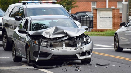 front of a car that was damaged in a crash