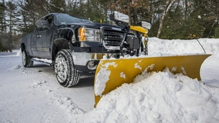 snow plow on the front of a truck